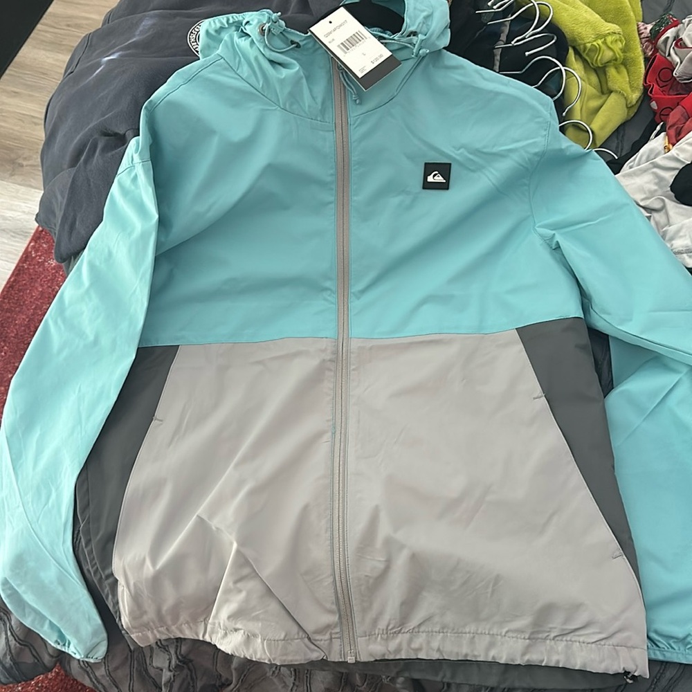 Quicksilver lightweight packable windbreaker jacket blue men’s large BNWT